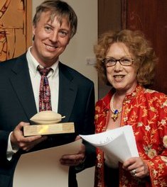Art Pollard of Amano receives a special award for 'Most promising new bean to bar chocolate maker' from Sara Jayne Stanes