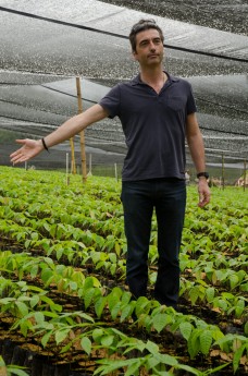 Frank Homann shows visitors Xoco nursey in Izabal, Guatemala