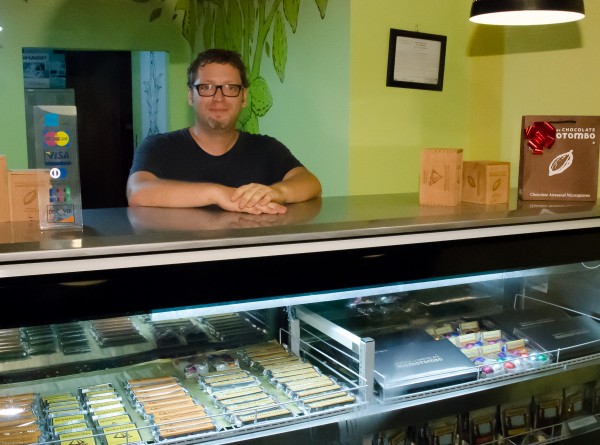 Carlos Mann at the counter of the Momotombo factory shop